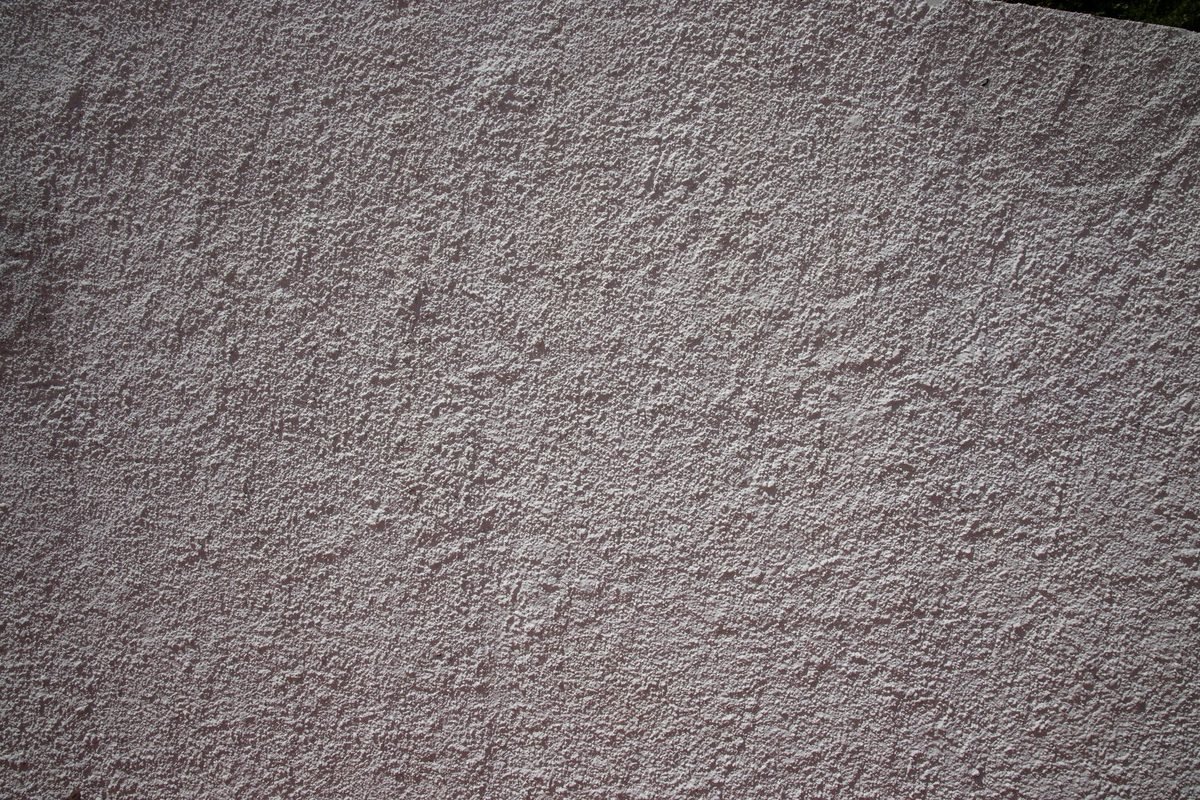 Enduit de façade gratté, finition à gros grain